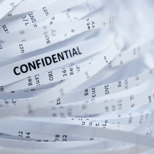 Pile of shredded confidential paper.