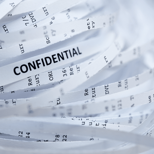 Pile of shredded confidential paper.